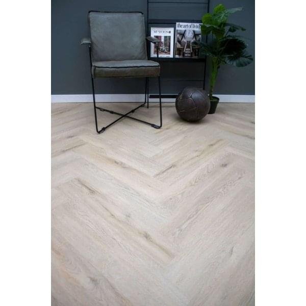 Light wood herringbone pattern flooring